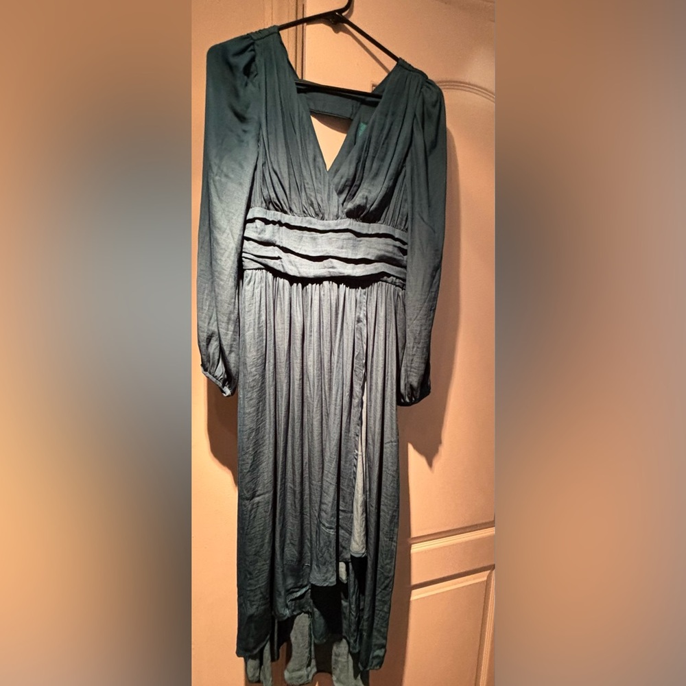 Beautiful emerald green dress by Anthropologie.